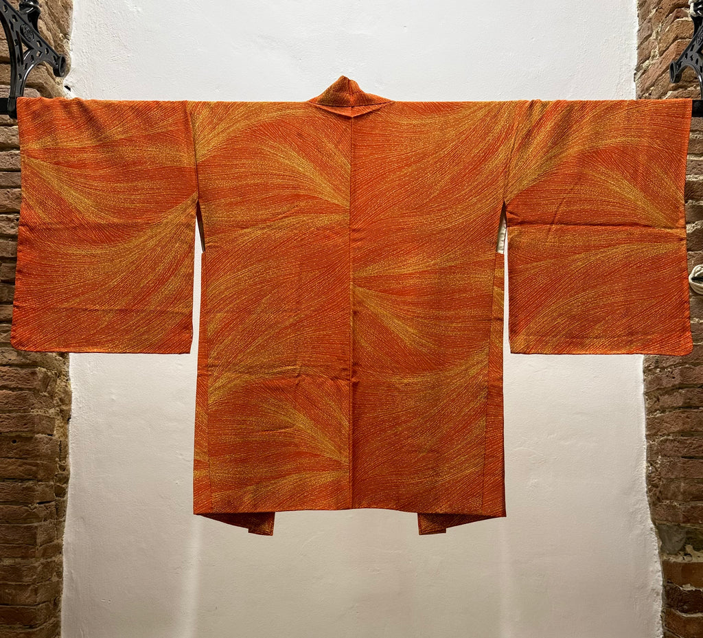 Arancione con erba estiva